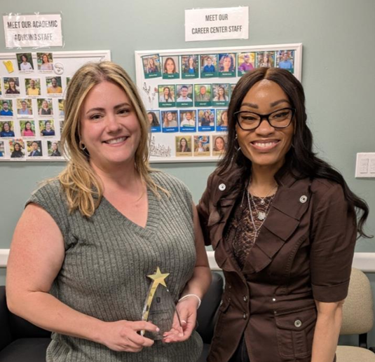 Erin Gallagher receiving the STAR Award of the Month