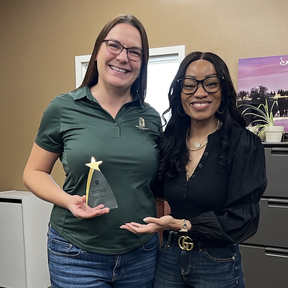 Amy Brown receiving the STAR Award of the Month