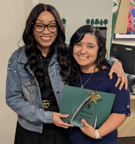 Ruby Espinoza receiving the STAR Award of the Month
