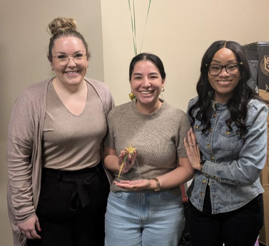 Ashley Torres receiving the STAR Award of the Month