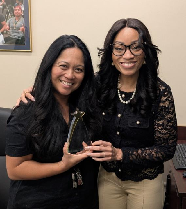 Raquel Reber receiving the STAR Award of the Month