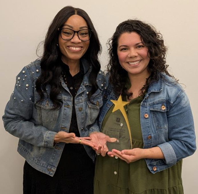 Stephanie Reyes receiving the STAR Award of the Month