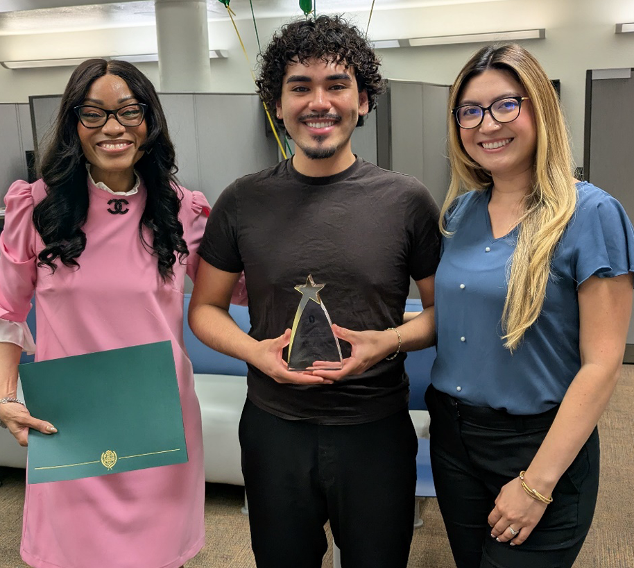 Luis Cortes receiving the STAR Award of the Month