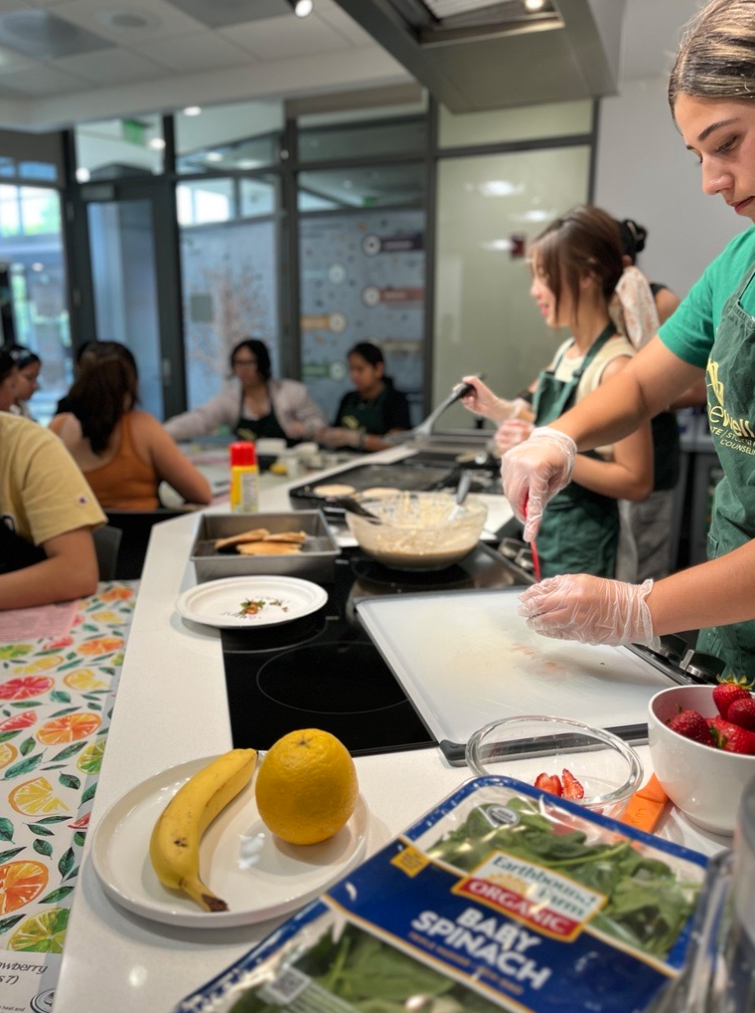 Student cooking a meal