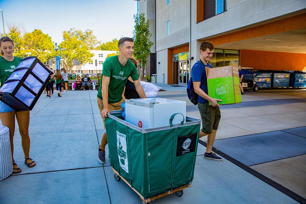 Students moving in to campus housing