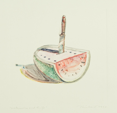 cut half watermelon with knife sticking out