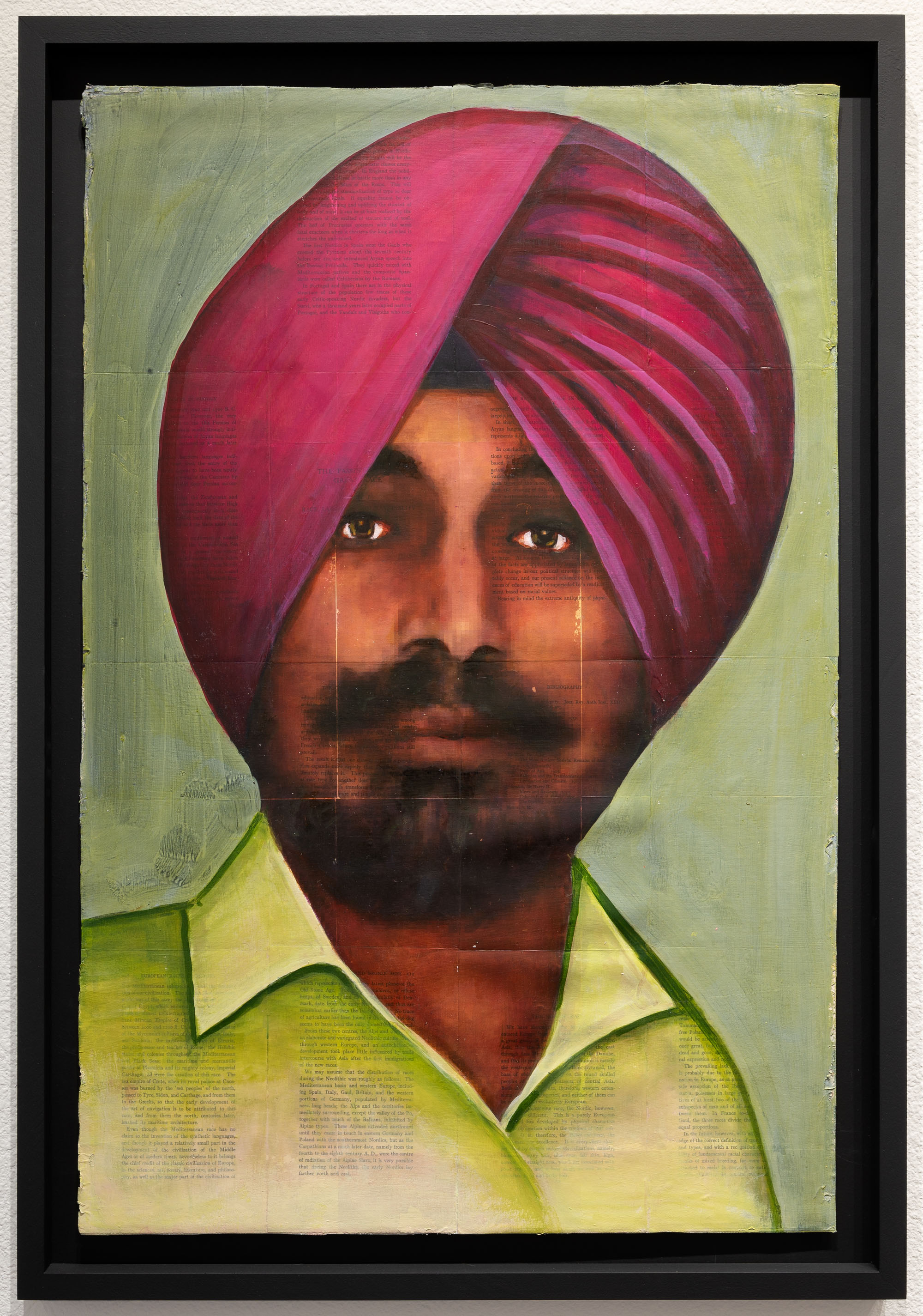 portrait of Sikh man with pink turban and green shirt
